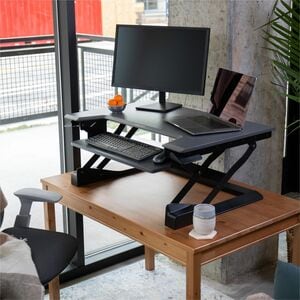 Ergotron WorkFit-T, Standing Desk Workstation (black with grey surface) - Gray Top - 35 lb Capacity - Height Adjustable - 