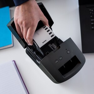 Brother QL-600 Desktop Direct Thermal Printer - Monochrome - Label Print - USB - 2.40" Print Width - 2.80 in/s Mono - 300 