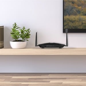 Netgear Nighthawk AX4 LAX20 Wi-Fi 6 IEEE 802.11ax 1 SIM Cellular Modem/Wireless Router - 4G - LTE - Dual Band - 2.40 GHz I