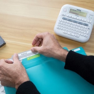 Brother® P-touch PT-D220 Home/Office Everyday Label Maker - 14 Fonts - 180 dpi - QWERTY keyboard - Takes TZe Label Tapes u