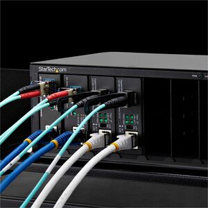 StarTech.com 7 Slot Media Converter Chassis - Black - TAA Compliant - Rack-mountable