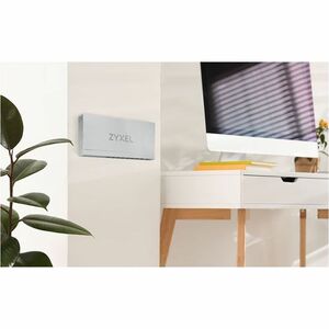ZYXEL XMG-100 XMG-105 5 Ports Ethernet Switch - 10 Gigabit Ethernet - 2.5GBase-T, 10GBase-X - 2 Layer Supported - Modular 