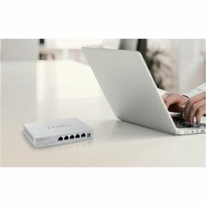 ZYXEL XMG-100 XMG-105 5 Ports Ethernet Switch - 10 Gigabit Ethernet - 2.5GBase-T, 10GBase-X - 2 Layer Supported - Modular 