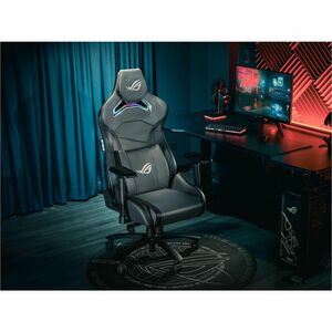 ROG Chariot X gaming chair in racing-car style with Aura RGB lighting featuring an adjustable high-density foam headrest m