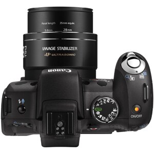 Canon PowerShot SX1 IS 10 Megapixel Bridge Camera - 7.1 cm (2.8")LCD - Electronic Viewfinder - 20x Optical Zoom - 4x Digit